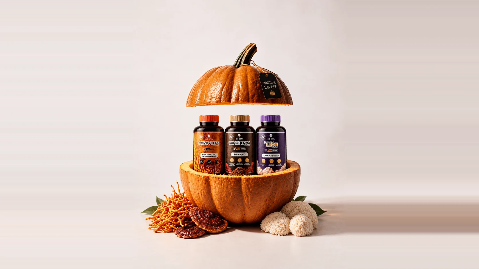 Los tres frascos de BIO-SETA dentro de una calabaza, sobre fondo claro